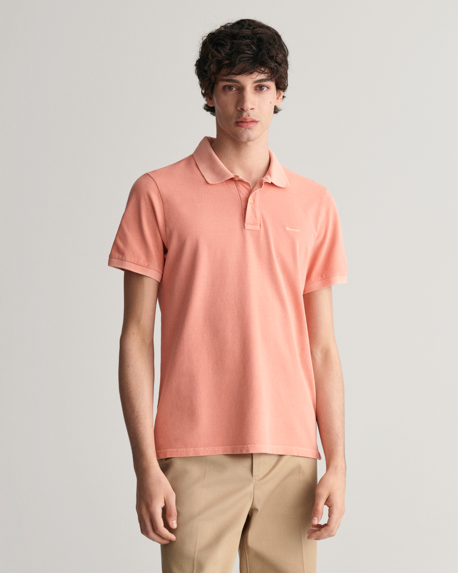 peach polo shirt